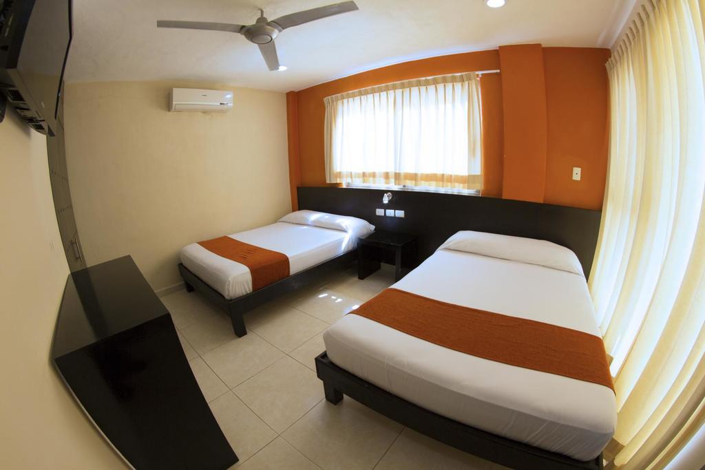 Hotel & Suites Domani Прогресо Экстерьер фото